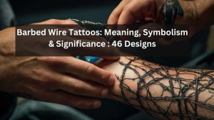 Barbed wire tattoo covering forearm; symbolizes strength, protection, and resilience with intricate, detailed linework.