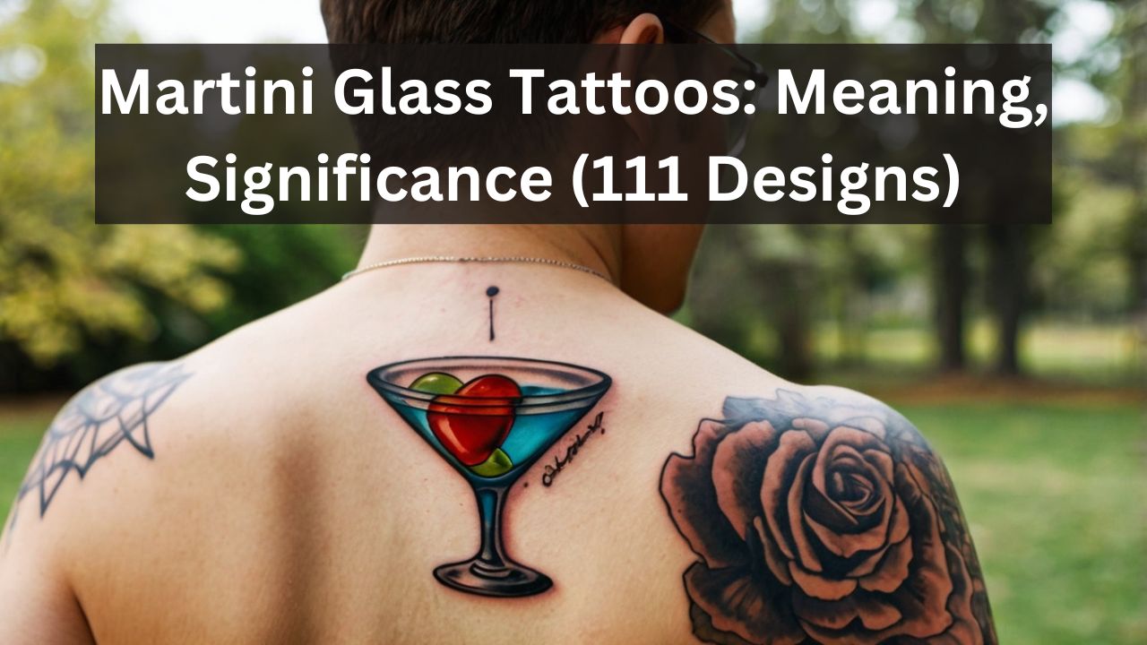 Tattoo of a martini glass with a red heart and green fruit, surrounded by a detailed rose design on the shoulder blade.