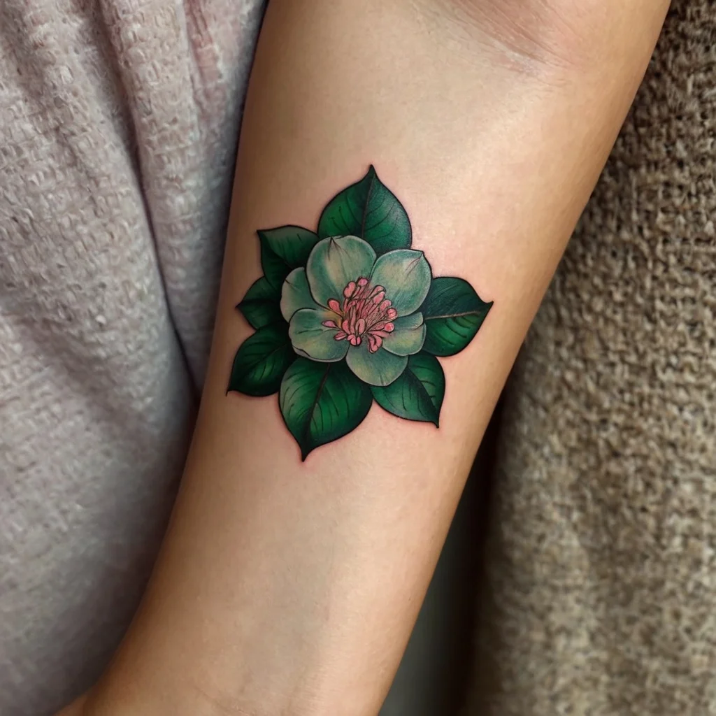 Vibrant green flower tattoo with pink stamens; features detailed shading and lifelike petals on inner arm.